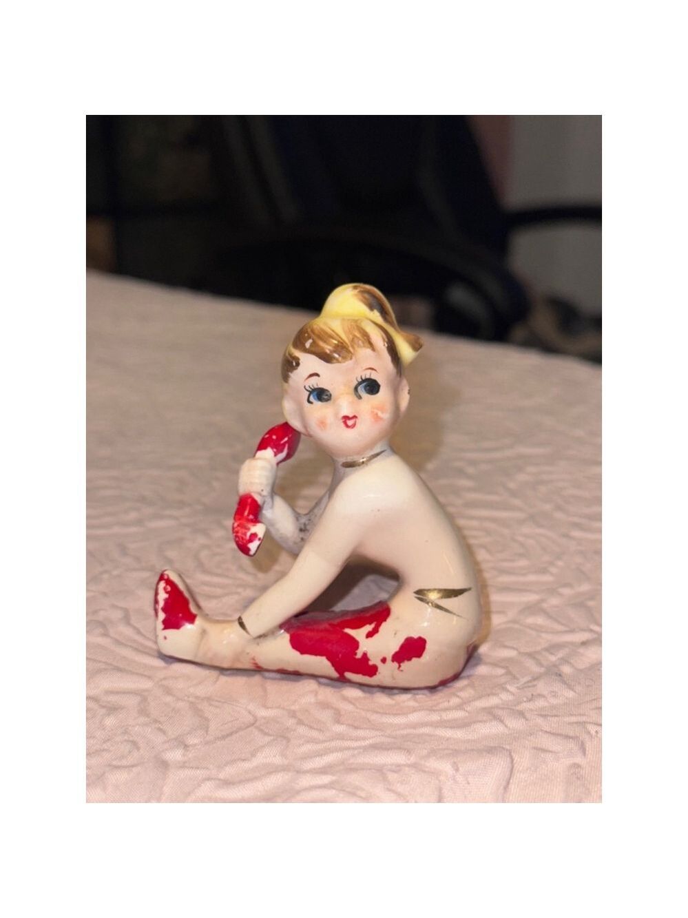 Porcelain girl on phone Japan stamped losing paint 1950's